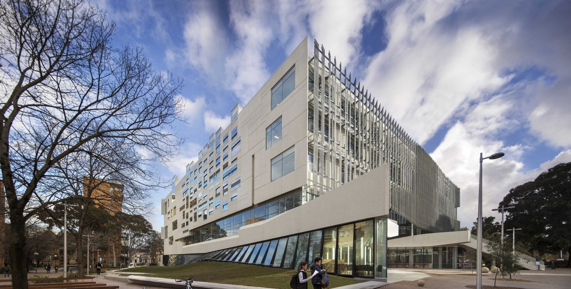 Photograph of the South East face of the Melbourne School of Design building.