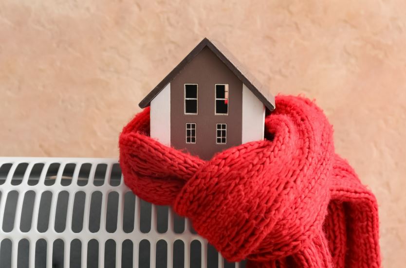 Warming Australia's homes: an example of experimental learning framework uniting community, research and industry