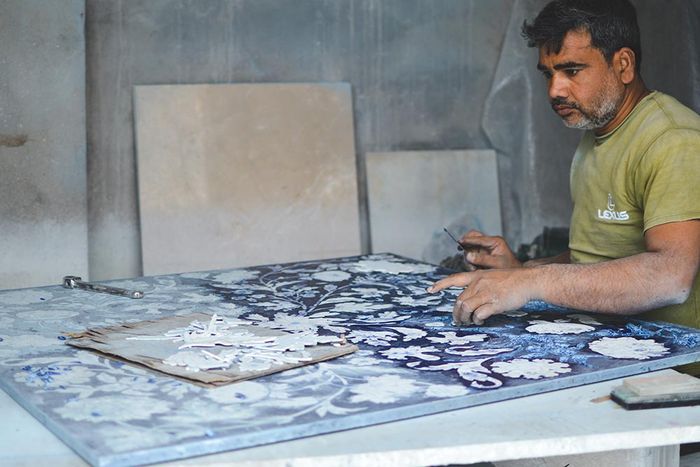 A stone inlay craftsman at Jayantilal Stone.