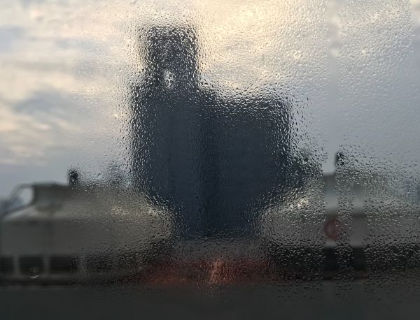 condensation on a curtain wall of an air conditioned hotel
