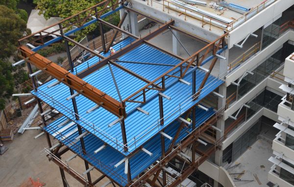 The blue material is Condek, a composite steel decking that supports the concrete as permanent formwork.