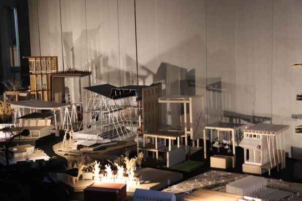 Photo of illuminated models.